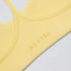 Reggiseno sportivo Soft Active con spalline incrociate in colore Lemon