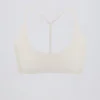 Reggiseno sportivo Soft Active con spalline incrociate in crema