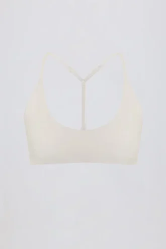 Reggiseno sportivo Soft Active con spalline incrociate in crema