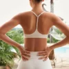 Reggiseno sportivo Soft Active con spalline incrociate in crema