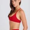 Reggiseno sportivo Soft Active con spalline incrociate in rosso fragola