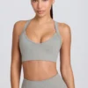 Reggiseno sportivo Super Sculpt senza cuciture con spalline incrociate sul retro in grigio melange
