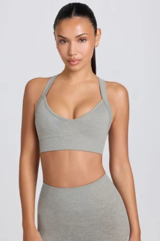 Reggiseno sportivo Super Sculpt senza cuciture con spalline incrociate sul retro in grigio melange
