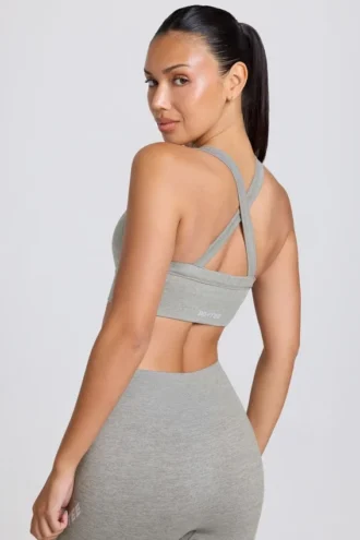 Reggiseno sportivo Super Sculpt senza cuciture con spalline incrociate sul retro in grigio melange