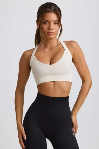 Reggiseno sportivo Super Sculpt senza cuciture con spalline incrociate sulla schiena in bianco