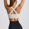 Reggiseno sportivo Super Sculpt senza cuciture con spalline incrociate sulla schiena in bianco
