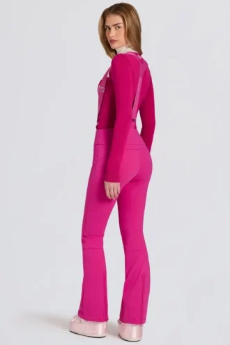 Salopette impermeabile a vita alta con bretelle in rosa magenta