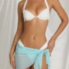 Sarong Elvire con lacci laterali in blu acqua Sarong Elvire con lacci laterali in blu acqua