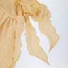 Sarong Molinas con lacci laterali a quadretti gialli Sarong Molinas con lacci laterali a quadretti gialli