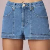 Shorts a vita alta e linea ad A Beata in lavaggio blu medio Shorts a vita alta e linea ad A Beata in lavaggio blu medio