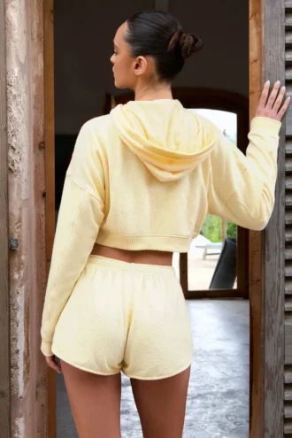Shorts a vita media con bottoni in giallo limone