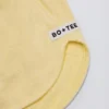 Shorts a vita media con bottoni in giallo limone Shorts a vita media con bottoni in giallo limone