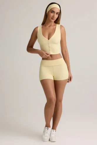 Shorts a vita media con risvolto Lisha in modal a coste, giallo crema
