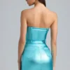 Simone Vestito corto senza spalline in denim metallizzato con cintura in color acquamarina Simone Vestito corto senza spalline in denim metallizzato con cintura in color acquamarina