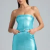 Simone Vestito corto senza spalline in denim metallizzato con cintura in color acquamarina Simone Vestito corto senza spalline in denim metallizzato con cintura in color acquamarina