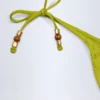 Slip a perizoma con dettaglio Cebu Charm in verde oliva Slip a perizoma con dettaglio Cebu Charm in verde oliva