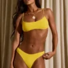 Top bikini Naxos con scollo rotondo in giallo dorato Top bikini Naxos con scollo rotondo in giallo dorato