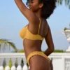 Slip Bikini a vita bassa in tessuto stropicciato color Marigold Slip Bikini a vita bassa in tessuto stropicciato color Marigold