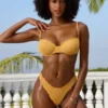 Slip Bikini a vita bassa in tessuto stropicciato color Marigold Slip Bikini a vita bassa in tessuto stropicciato color Marigold