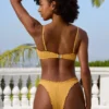 Slip Bikini a vita bassa in tessuto stropicciato color Marigold Slip Bikini a vita bassa in tessuto stropicciato color Marigold