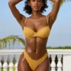 Slip Bikini a vita bassa in tessuto stropicciato color Marigold Slip Bikini a vita bassa in tessuto stropicciato color Marigold