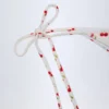 Slip Bikini Cheeky Cove con lacci laterali in stampa ciliegia Slip Bikini Cheeky Cove con lacci laterali in stampa ciliegia