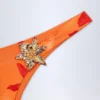 Slip Bikini con dettagli metallici Beqa con stampa Orange Orchid Slip Bikini con dettagli metallici Beqa con stampa Orange Orchid