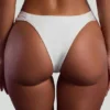 Top bikini a fascia con perline Praslin in avorio Top bikini a fascia con perline Praslin in avorio