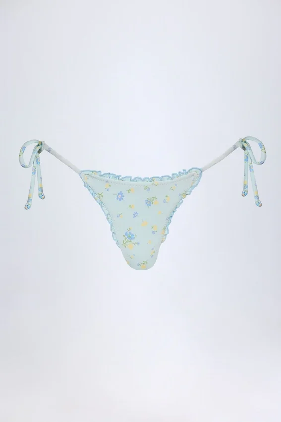 Slip Bikini con lacci laterali Nieva in blu floreale Slip Bikini con lacci laterali Nieva in blu floreale