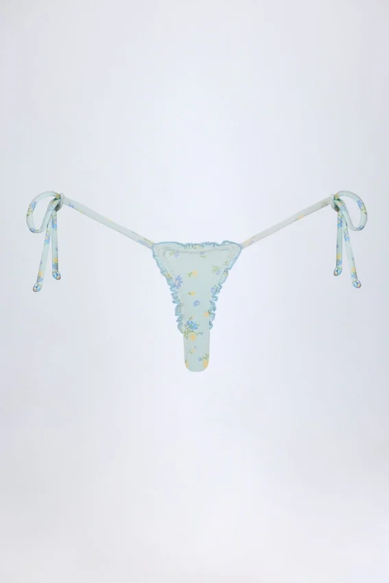 Slip Bikini con lacci laterali Nieva in blu floreale Slip Bikini con lacci laterali Nieva in blu floreale