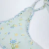 Slip Bikini con lacci laterali Nieva in blu floreale Slip Bikini con lacci laterali Nieva in blu floreale