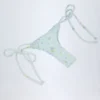 Slip Bikini con lacci laterali Nieva in blu floreale Slip Bikini con lacci laterali Nieva in blu floreale