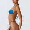 Top bikini con scollo all’americana e ruches decorato Clearwater in blu oceano Top bikini con scollo all’americana e ruches decorato Clearwater in blu oceano