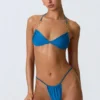 Top bikini con scollo all’americana e ruches decorato Clearwater in blu oceano Top bikini con scollo all’americana e ruches decorato Clearwater in blu oceano