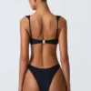 Slip Bikini con parti inferiori decorate Volute in nero Slip Bikini con parti inferiori decorate Volute in nero