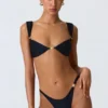 Slip Bikini con parti inferiori decorate Volute in nero Slip Bikini con parti inferiori decorate Volute in nero