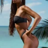 Slip Bikini con ruches decorati Pacifico in nero Slip Bikini con ruches decorati Pacifico in nero