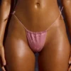Slip un costume da bagno con coulisse decorato in rosa Slip un costume da bagno con coulisse decorato in rosa