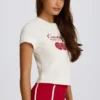 T-shirt corta con grafica in avorio T-shirt corta con grafica in avorio