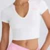 T-shirt corta in jersey di cotone elasticizzato con stampa grafica in bianco