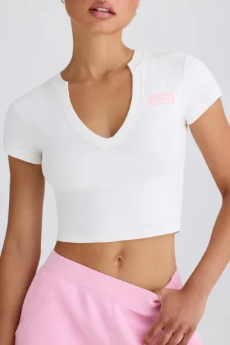 T-shirt corta in jersey di cotone elasticizzato con stampa grafica in bianco