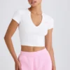 T-shirt corta in jersey di cotone elasticizzato con stampa grafica in bianco