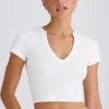 T-shirt corta in jersey di cotone elasticizzato con stampa grafica in bianco