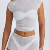 T-shirt corta trasparente con arricciature Santana in bianco T-shirt corta trasparente con arricciature Santana in bianco
