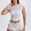 T-shirt corta trasparente con arricciature Santana in bianco T-shirt corta trasparente con arricciature Santana in bianco