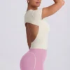 T-shirt lunga con cut-out color crema T-shirt lunga con cut-out color crema