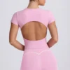 T-shirt lunga con cut-out in rosa antico T-shirt lunga con cut-out in rosa antico