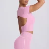 T-shirt lunga con cut-out in rosa antico T-shirt lunga con cut-out in rosa antico