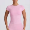 T-shirt lunga con cut-out in rosa antico T-shirt lunga con cut-out in rosa antico