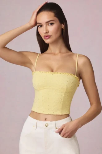 Top a canotta Hania in Modal con ricamo inglese, giallo limone